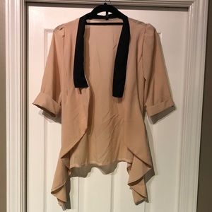 Sleek beige and black cardigan